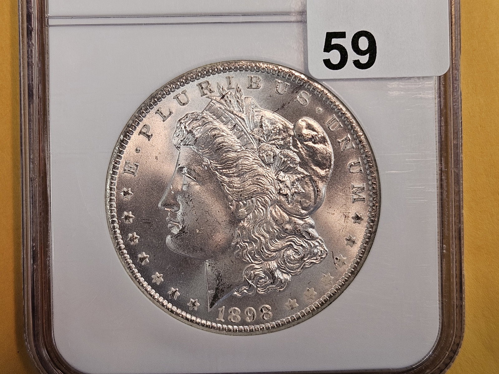 GEM! NGC 1898-O Morgan Dollar in Mint State 66: Lovely Satiny luster 