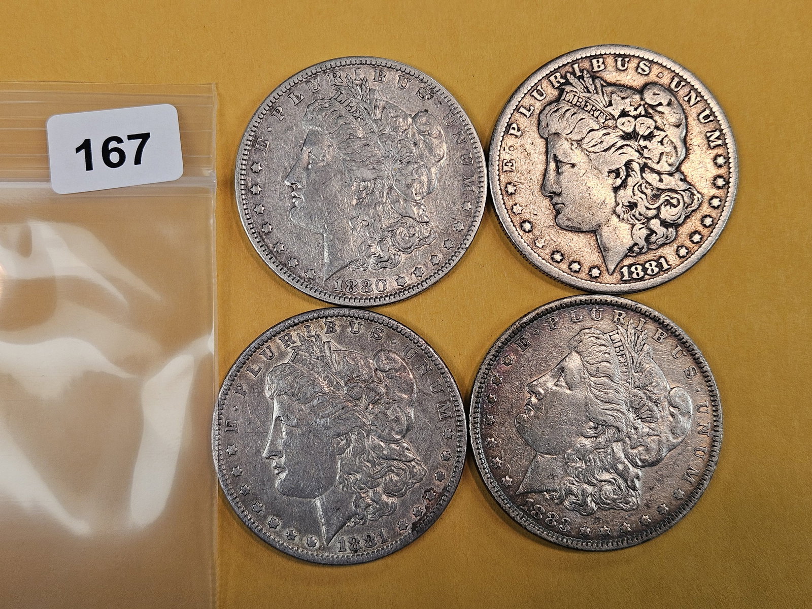Four mixed Morgan Silver Dollars: Circulated 