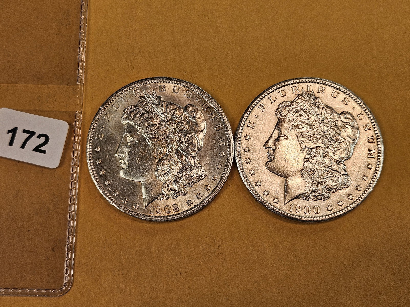 Two Brilliant About Uncirculated Plus Morgan silver Dollars (1 of 3)