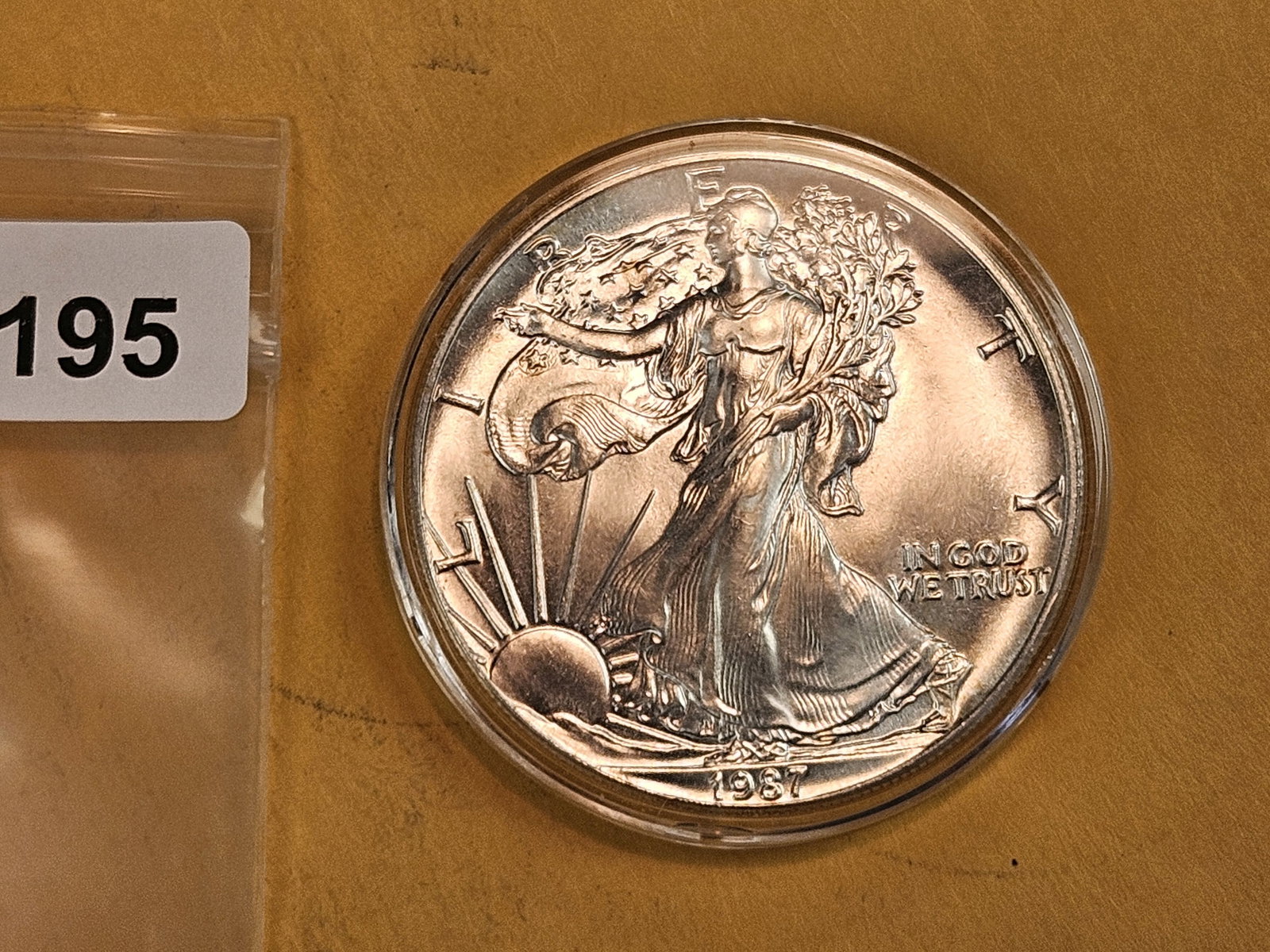 GEM Brilliant Uncirculated 1987 American Silver Eagle: In original plastic capsule 