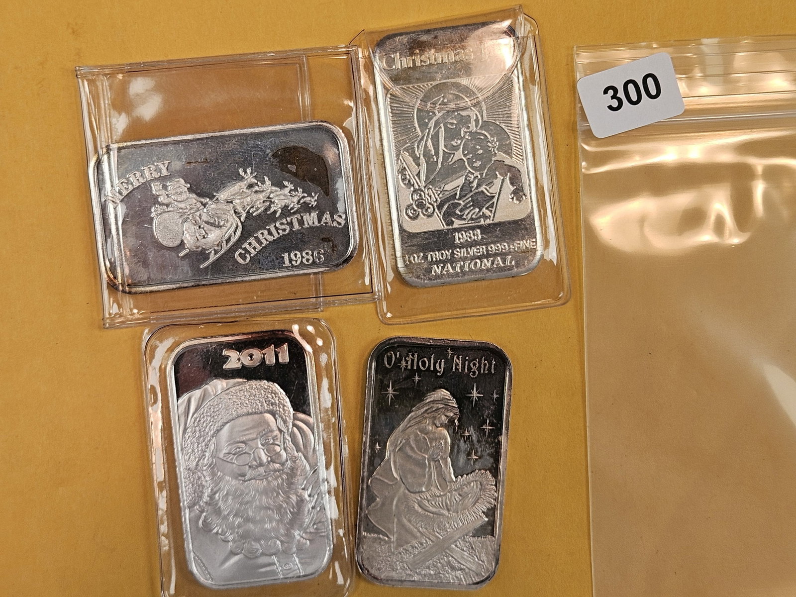 Four 1-Troy ounce .999 fine silver Proof art bars: Holiday's