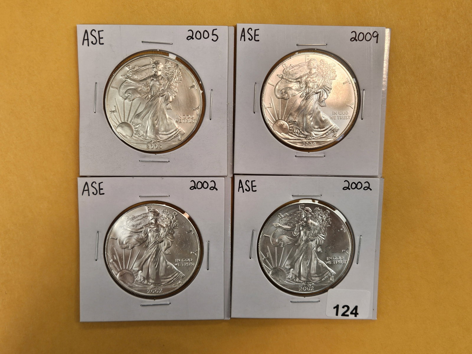 Four Brilliant Uncirculated American Silver Eagles: Mixed