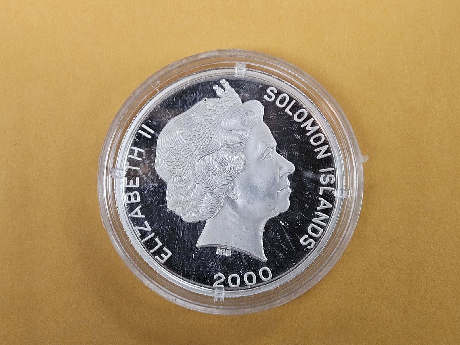 2000 GEM Proof Deep Cameo Solomon Islands silver Five Dollars: Partially colorized reverse