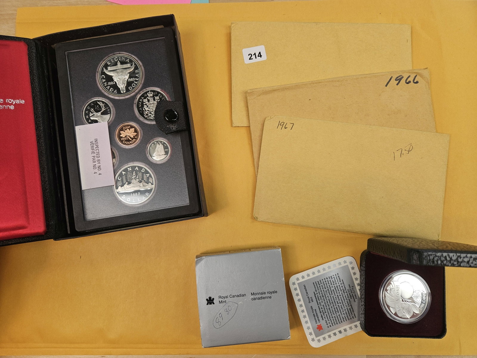 Five sets from Canada with Silver Dollars: Five silver dollars