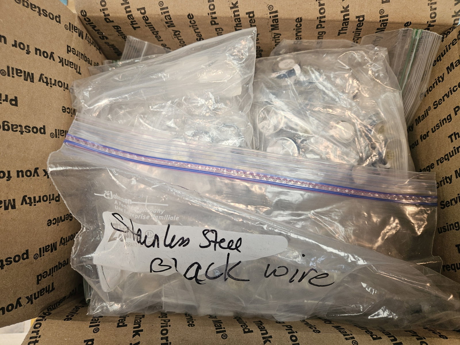 RINGS, RINGS and more RINGS!: Flat Rate Medium Box (ships separately) full of rings. I think they're all steel or similar rings. About 100 or more in there. Be like Beyonce and put a ring on it!