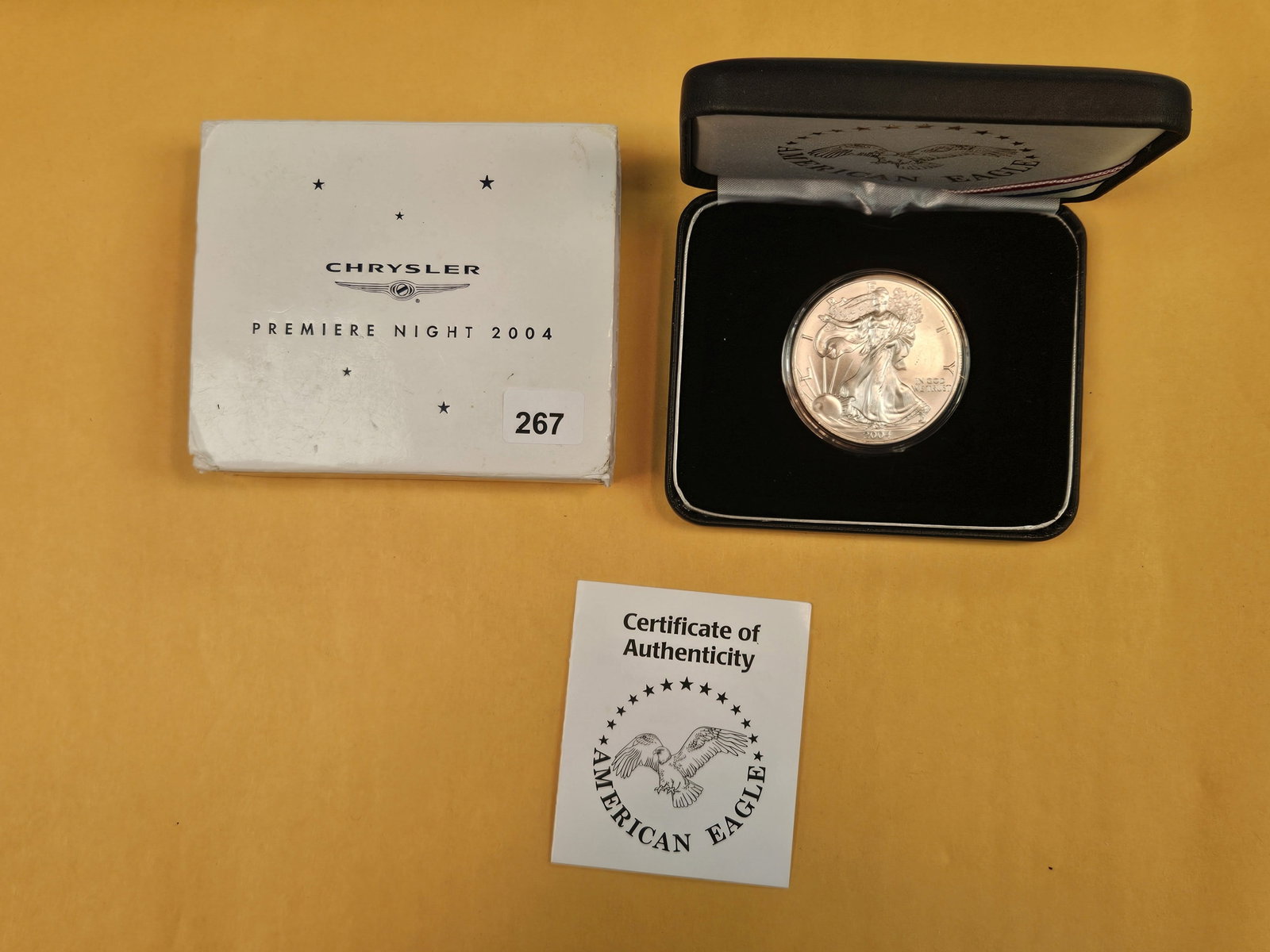 GEM Brilliant Uncirculated 2000 American Silver Eagle: In Chrysler Premier Night 2004 Holder