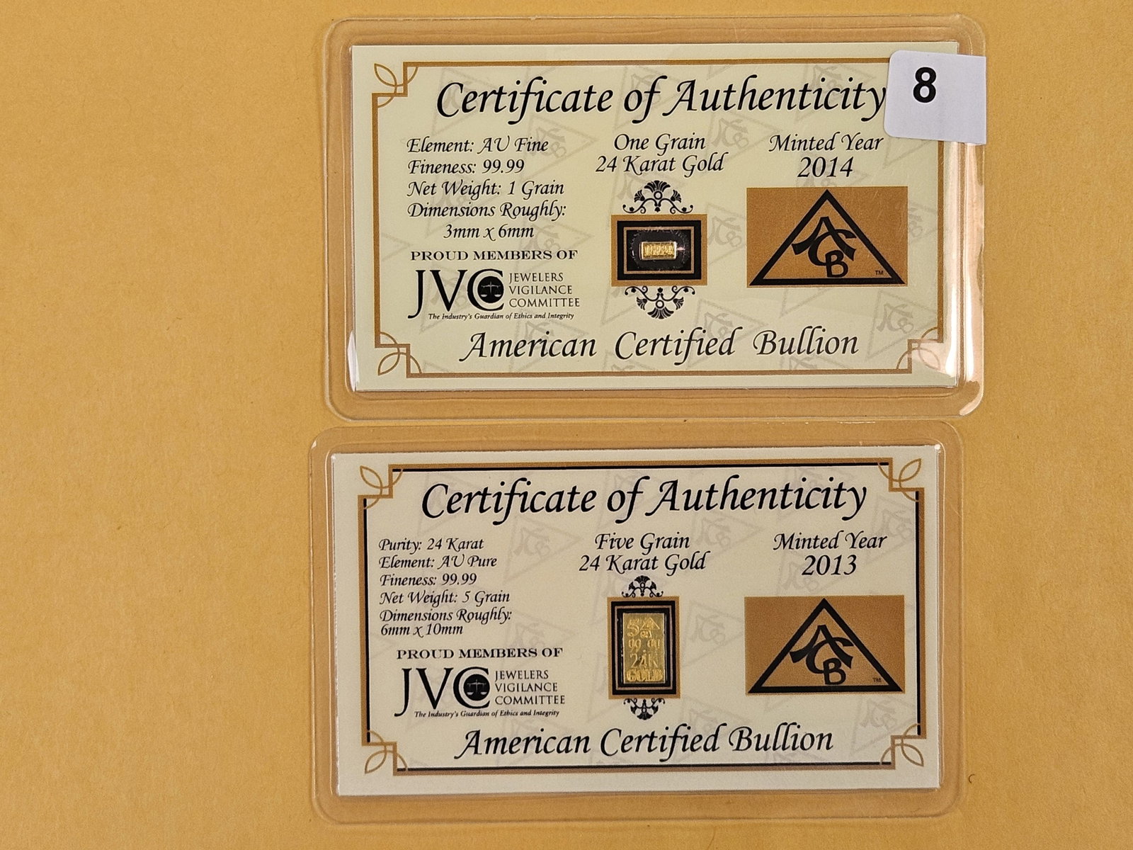GOLD! Two .9999 fine Gold bars in Assay holder cards (1 of 4)