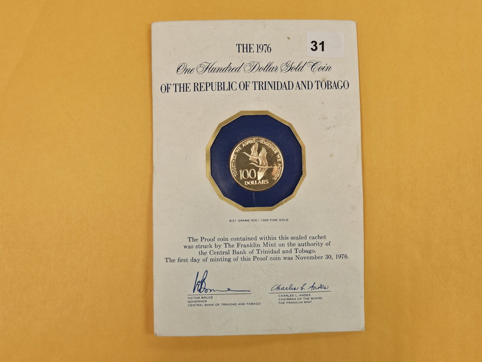 GOLD! 1976 GEM Proof Deep Cameo GOLD Republic of Trinidad and Tobago One Hundred Dollars: KM # 37. Composition: Gold. Fineness: 0.5000. Weight: 6.2100g. AGW: 0.0998oz. Melt Value: $453.70 (4/29/2026). In original packaging