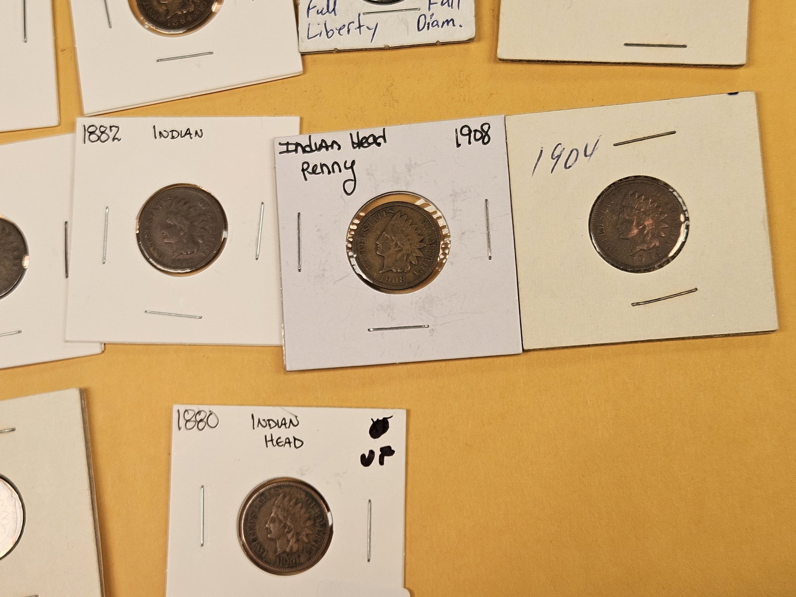 Seventeen mixed Indian Cents - 7