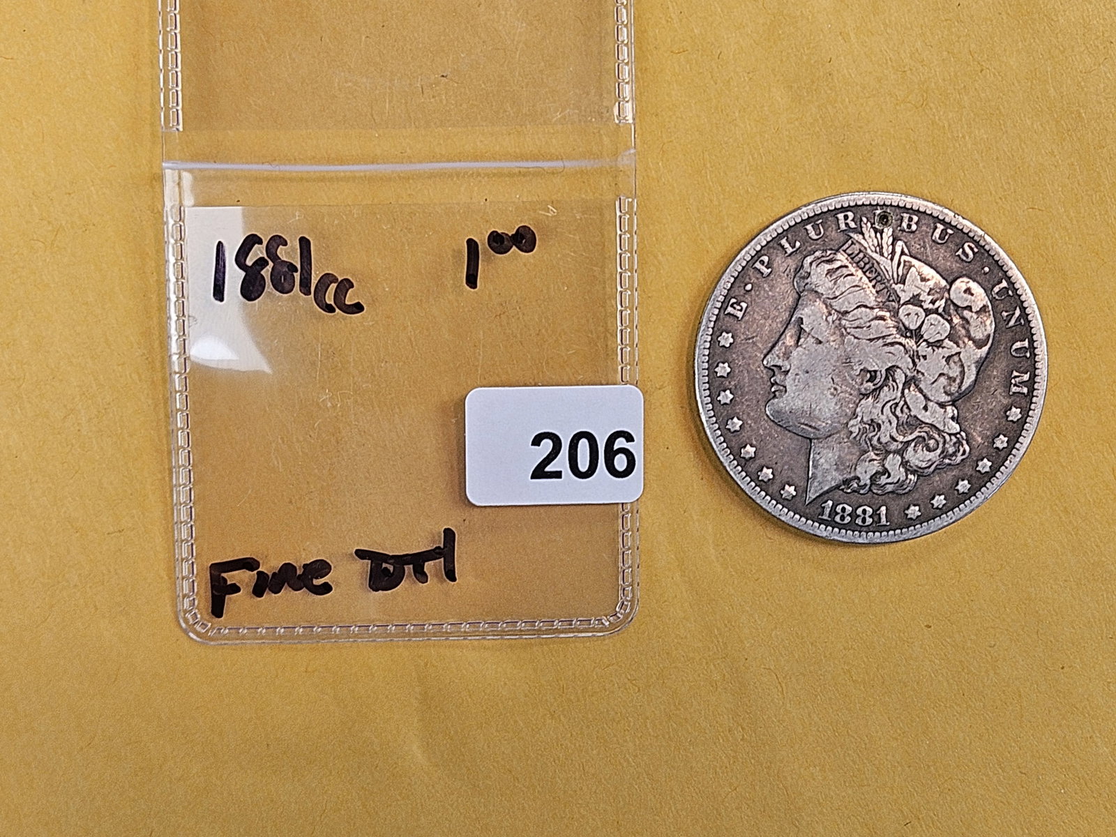 ** KEY DATE ** 1881-CC Morgan Dollar in Fine - details - 2