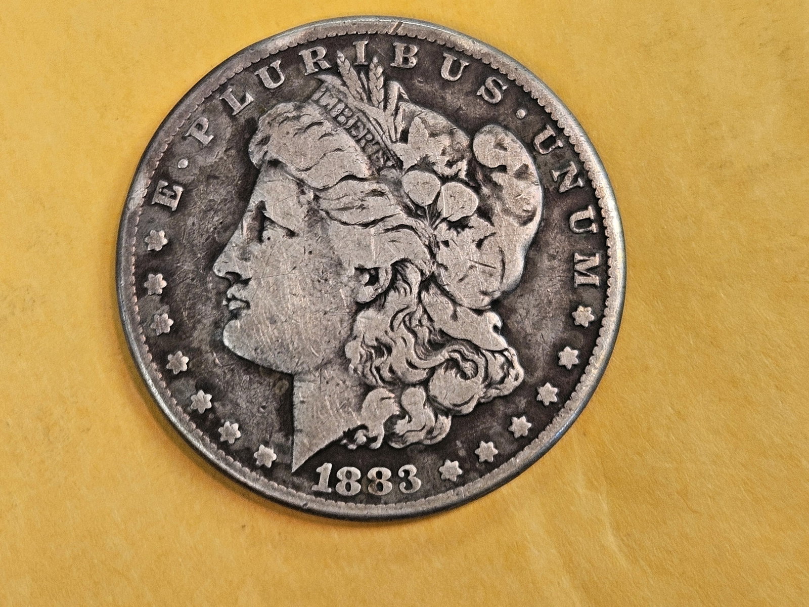 ** KEY DATE ** 1883-CC Morgan Dollar in Fine (1 of 3)