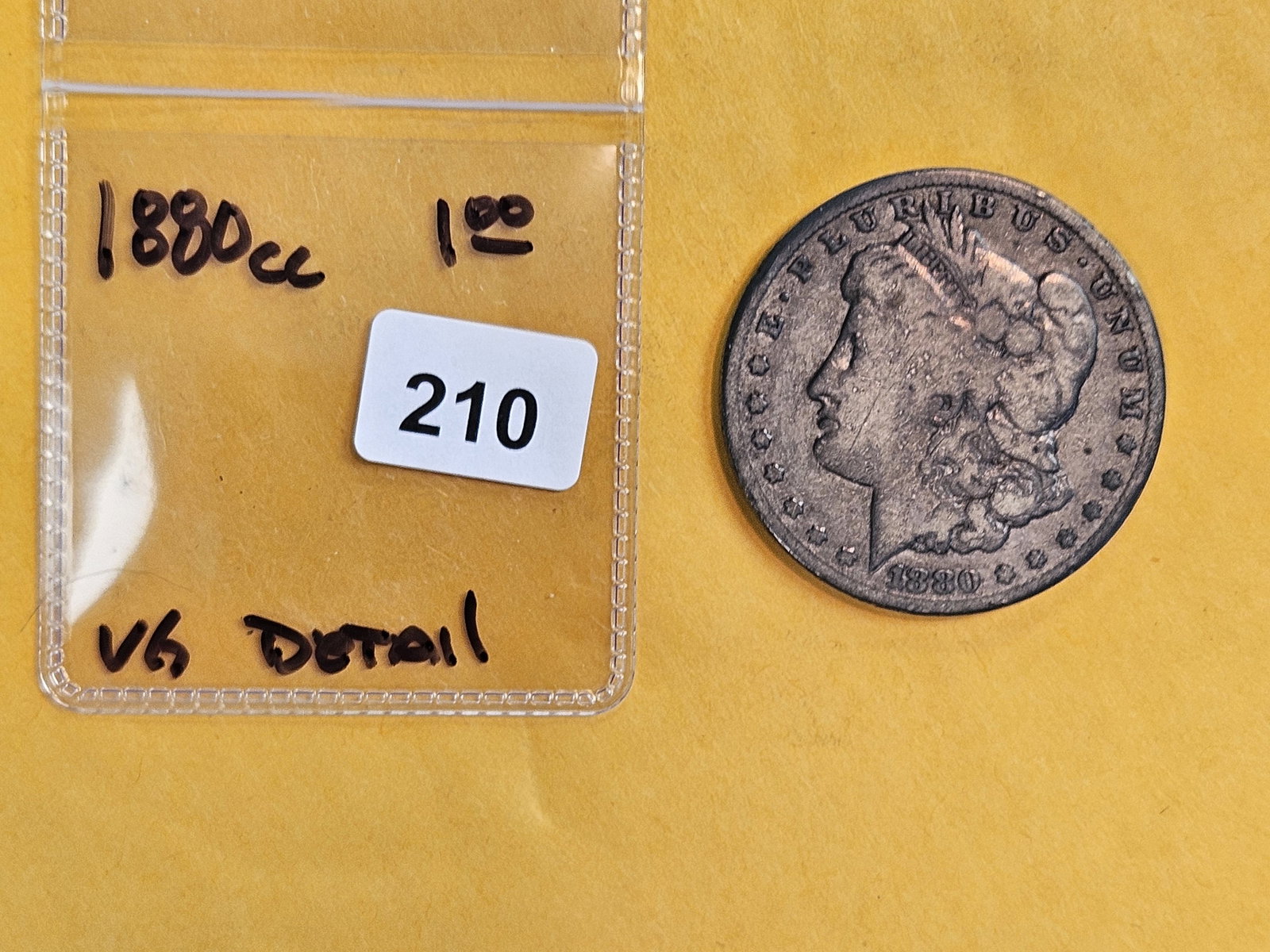 ** KEY DATE ** 1880-CC Morgan Dollar in Very Good - details - 2