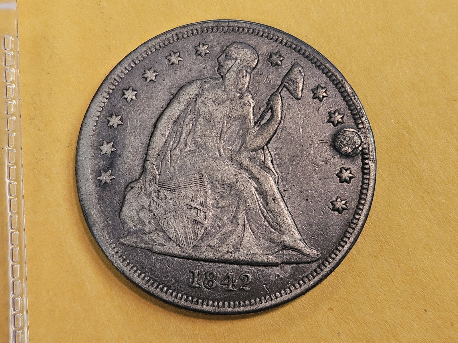 1842 Seated Liberty silver Dollar in Fine - details (1 of 3)