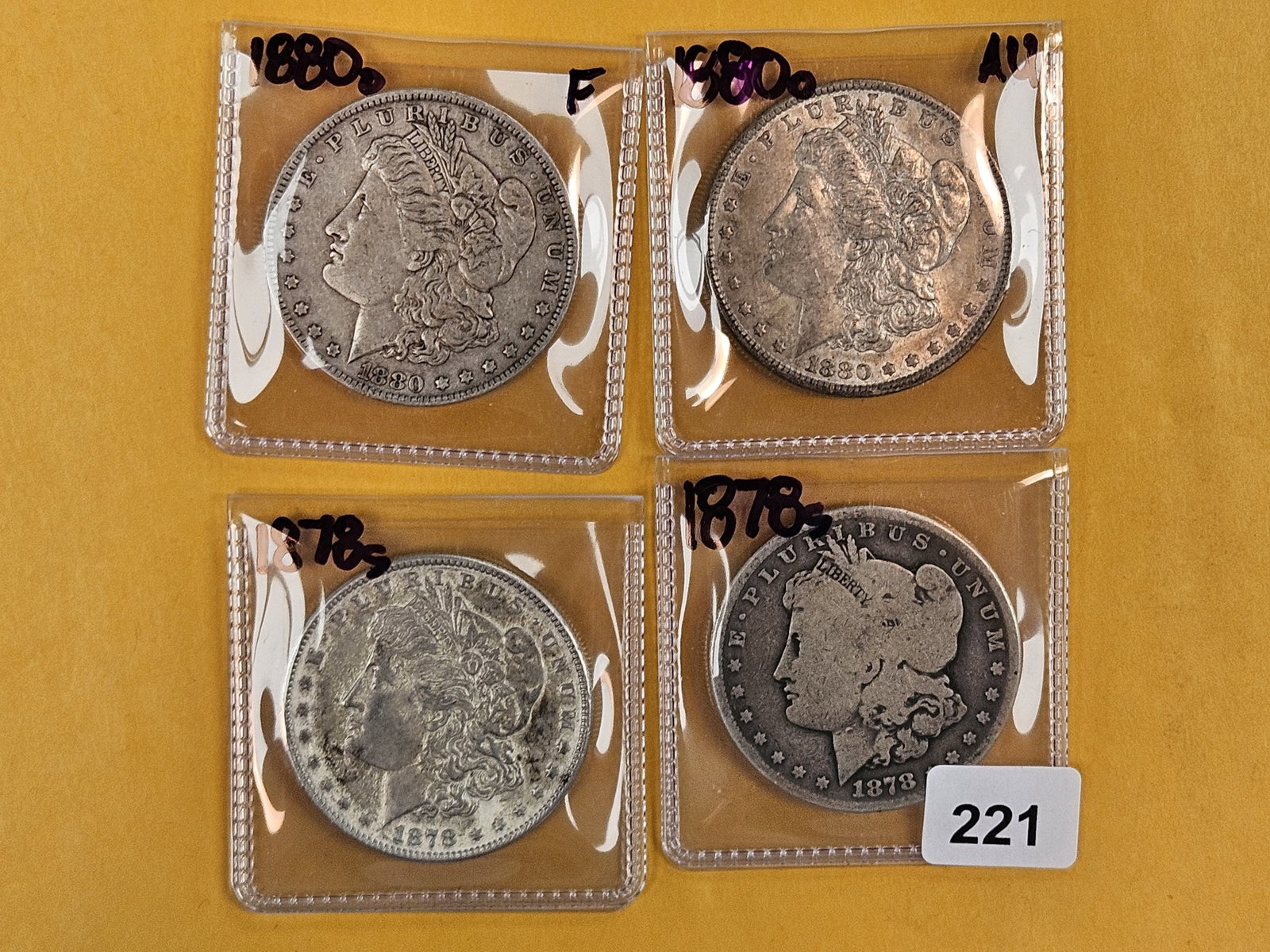 Four Morgan Silver Dollars (1 of 2)