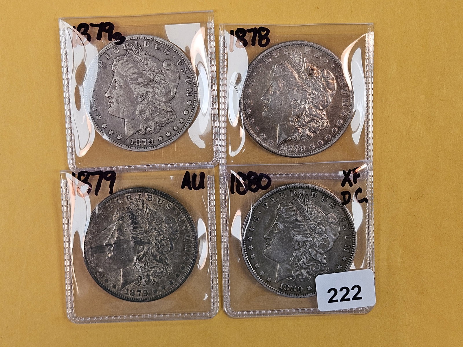 Four Morgan Silver Dollars (1 of 2)