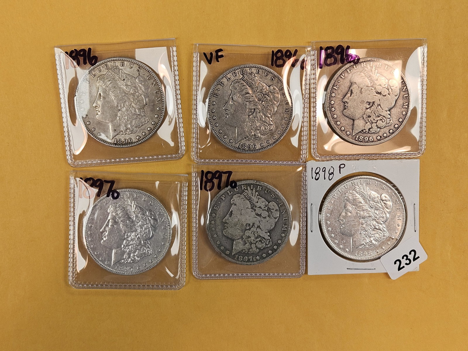 Six Morgan Silver Dollars (1 of 2)