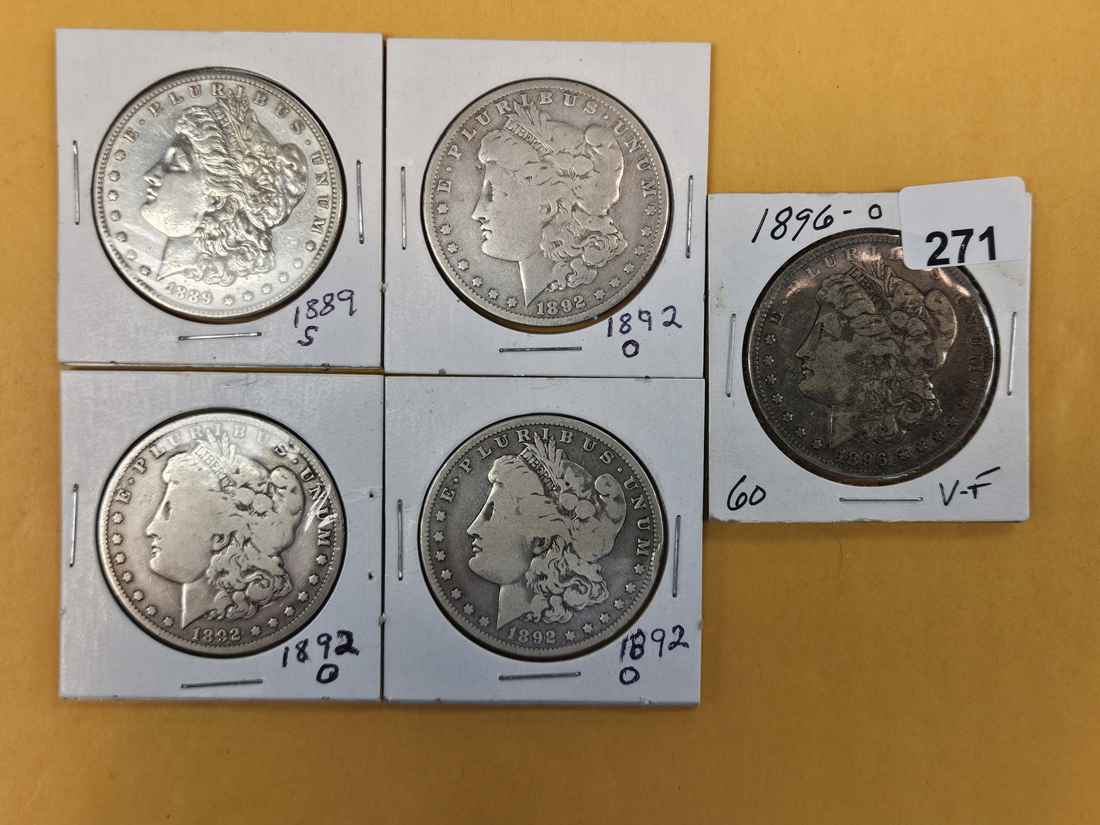 Five mixed, just slightly better, Morgan Silver Dollars (1 of 3)