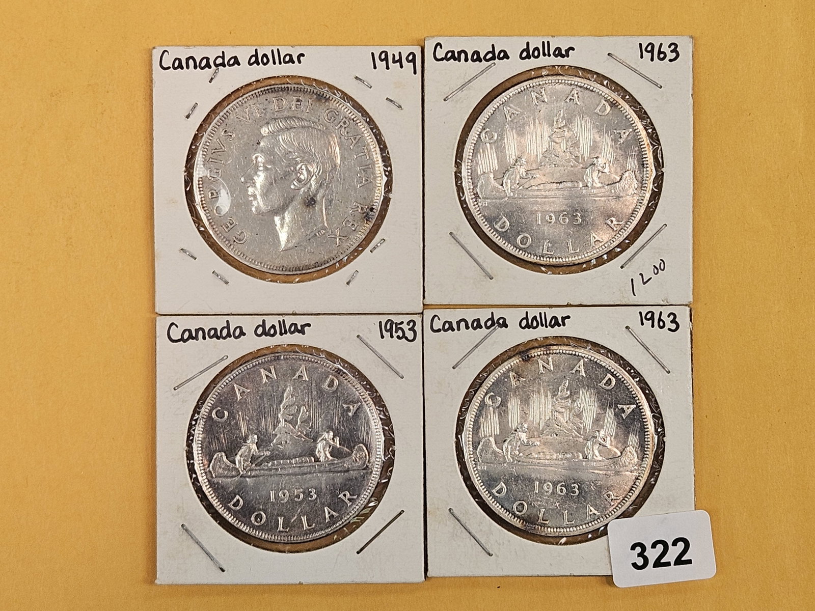 Four more Canadian Silver Dollars: Mixed