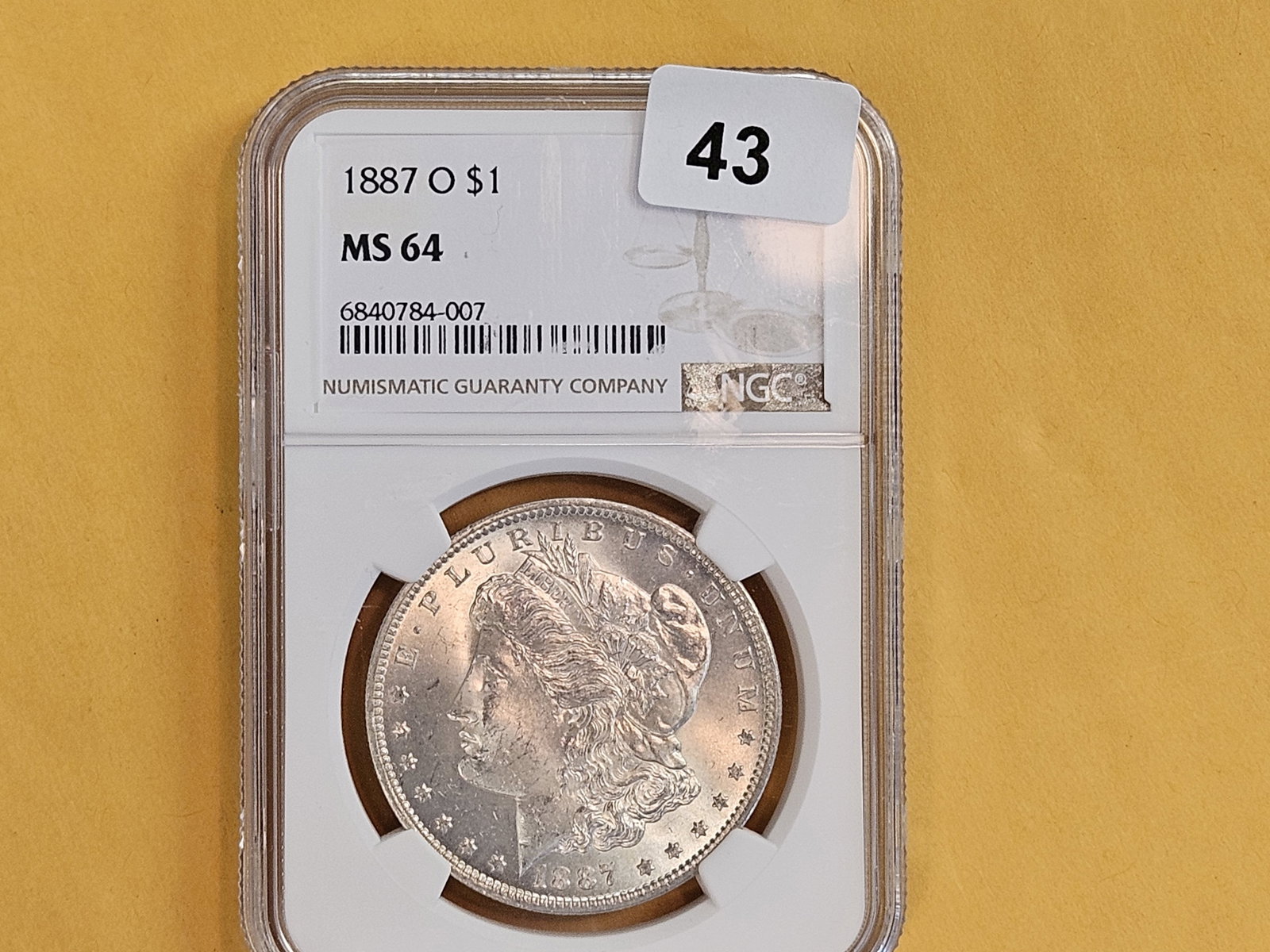 Better Grade! NGC 1887-O Morgan Dollar in Mint State 64 - 2