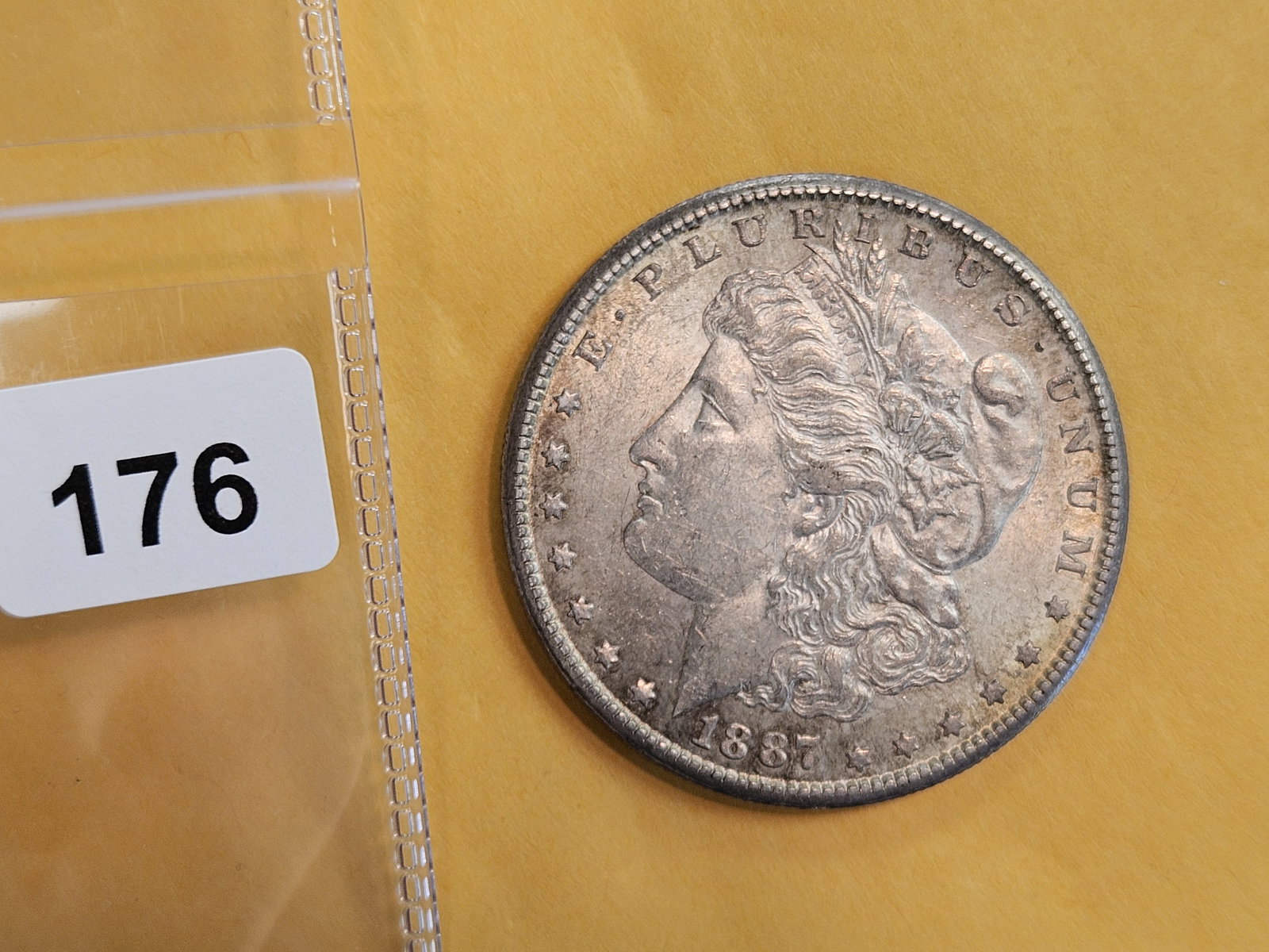 1887-S Morgan Dollar in About Uncirculated Plus - 2