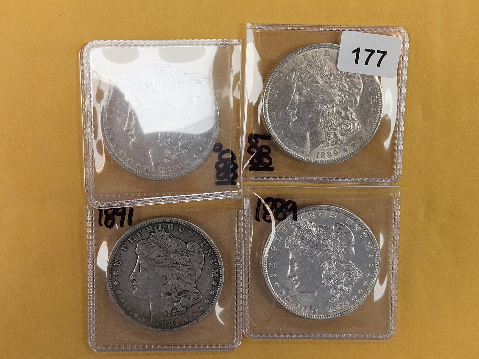 Four Morgan Silver Dollars (1 of 3)