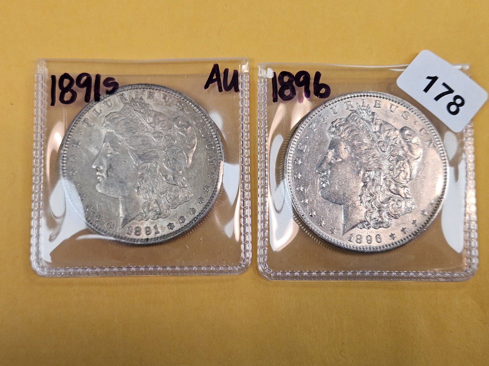 Two About Uncirculated plus Morgan Silver Dollars - 2