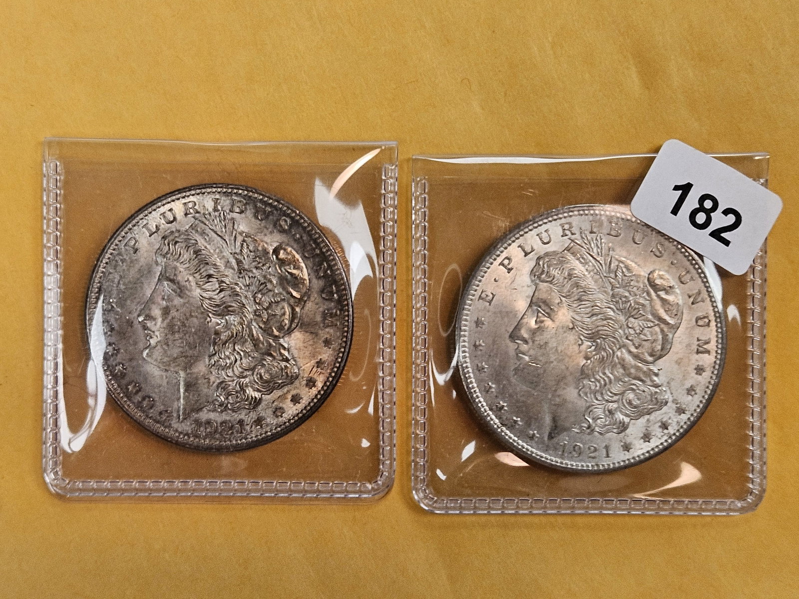 Two About Uncirculated plus Morgan Silver Dollars (1 of 3)