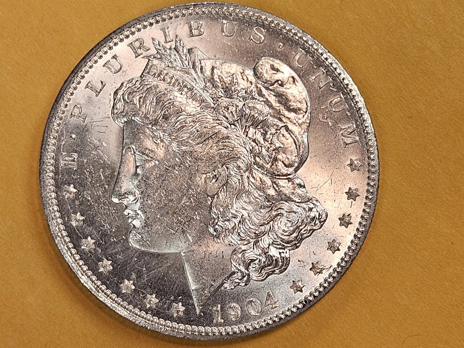 Very Choice Brilliant Uncirculated 1904-O Morgan Dollar: Good contrast