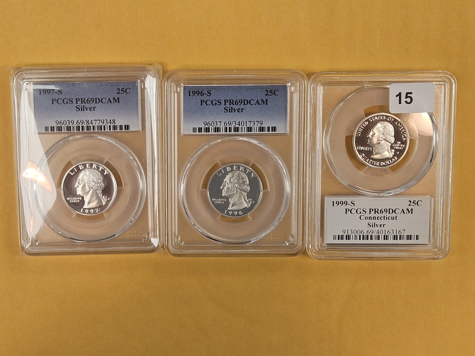 Three, PCGS-graded, SILVER Washington Quarters in Proof 69 Deep Cameo: 1997-S, 1996-S and 1999-S
