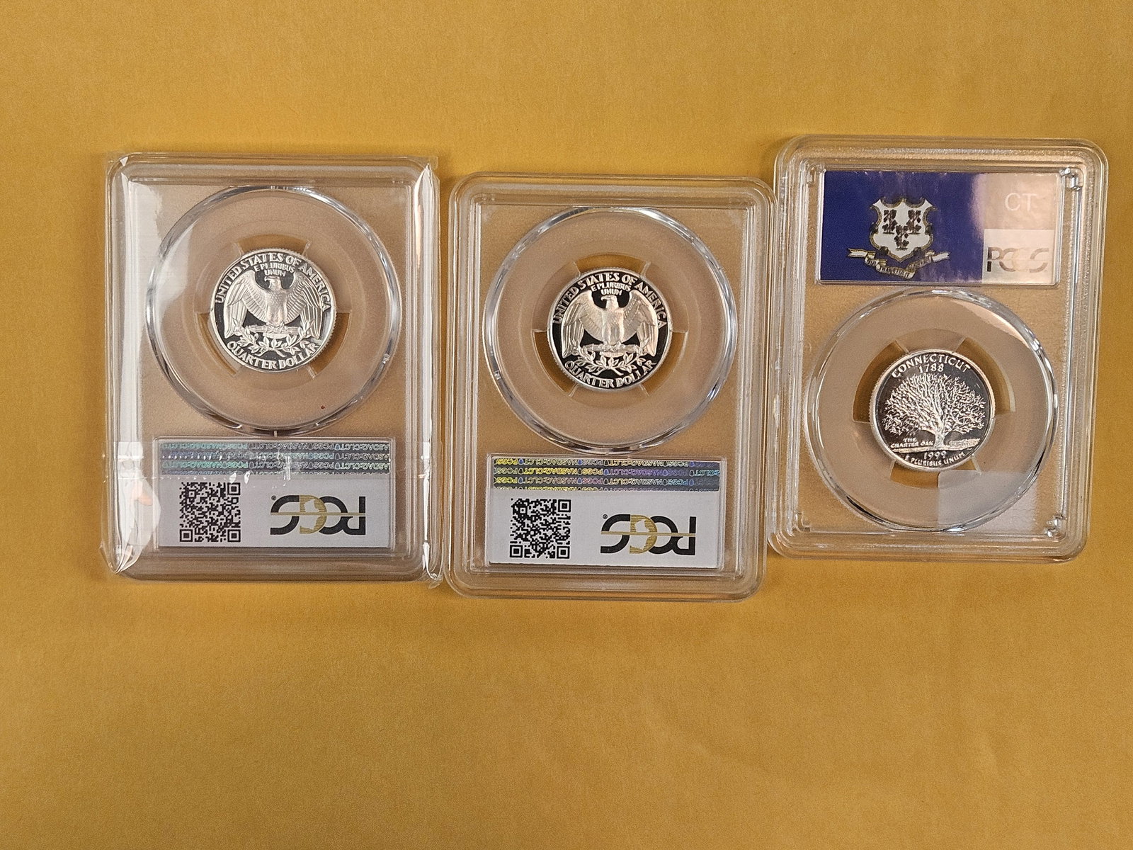 Three, PCGS-graded, SILVER Washington Quarters in Proof 69 Deep Cameo - 2