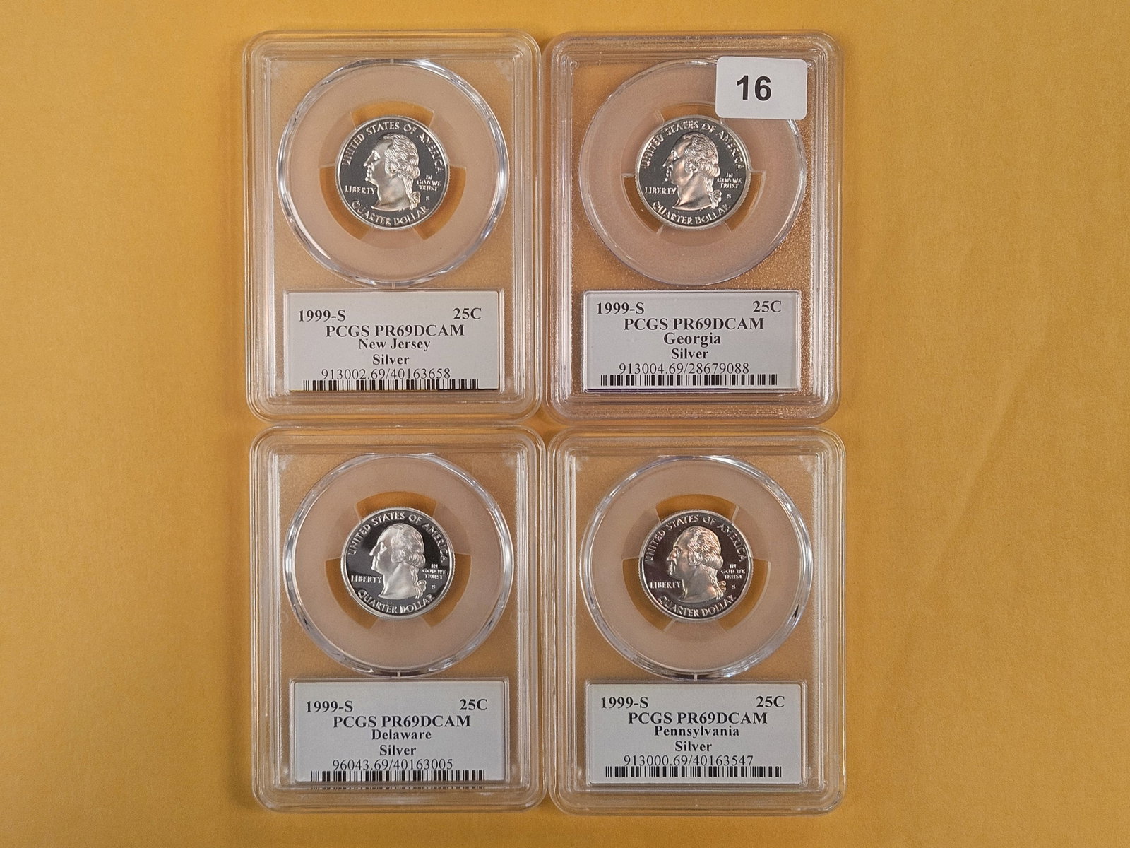 Four, PCGS-graded, SILVER Washington Quarters in Proof 69 Deep Cameo (1 of 2)