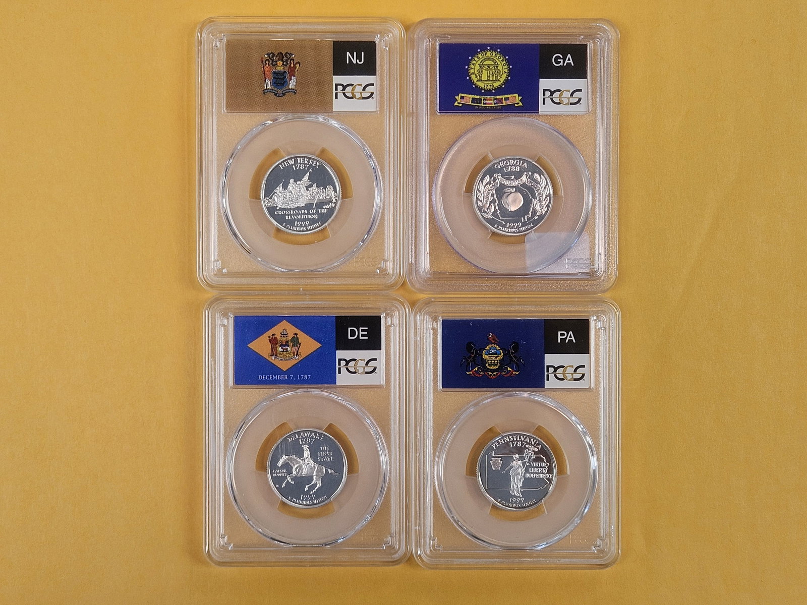 Four, PCGS-graded, SILVER Washington Quarters in Proof 69 Deep Cameo - 2