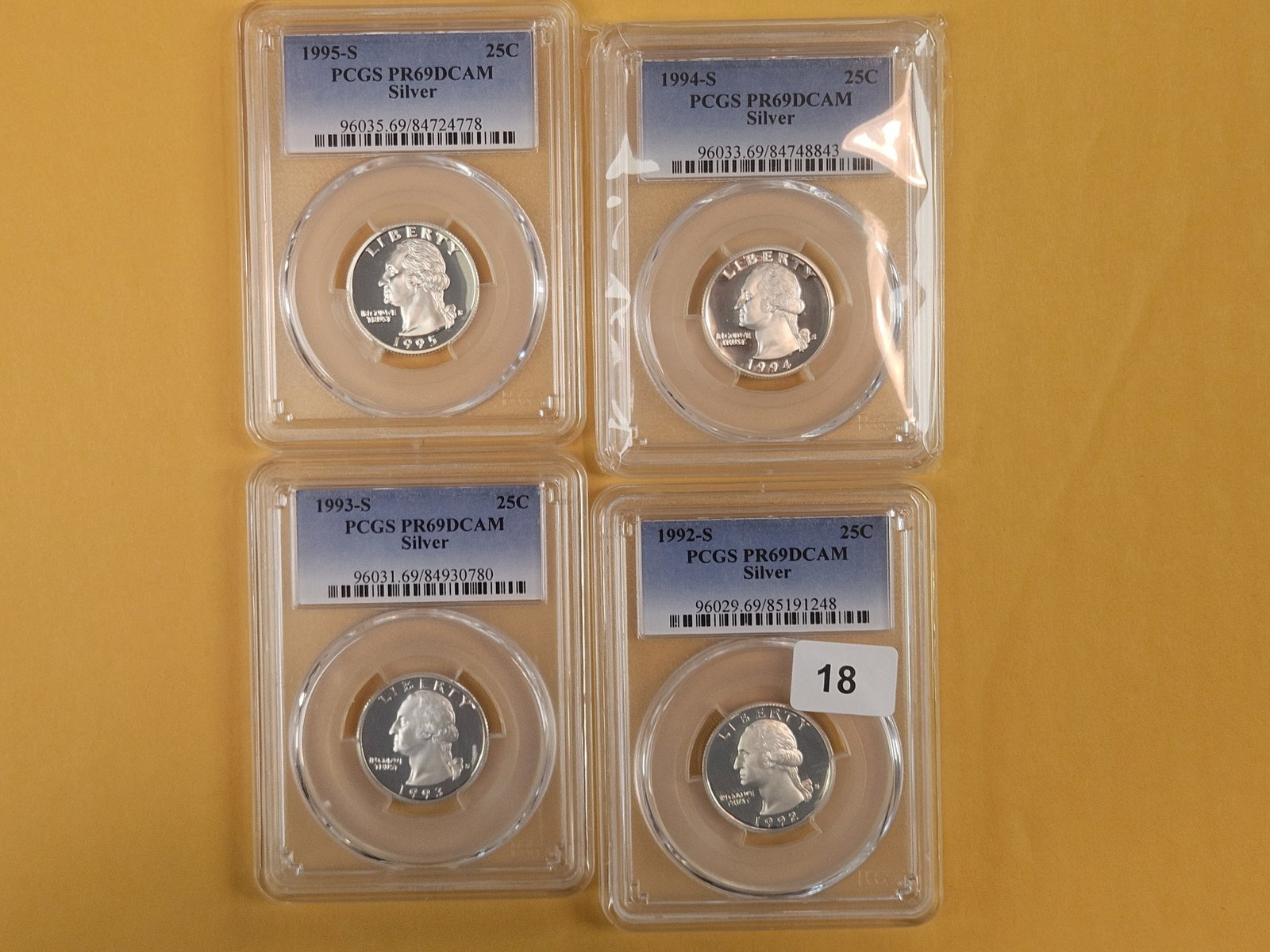 Four, PCGS-graded, SILVER Washington Quarters in Proof 69 Deep Cameo (1 of 2)