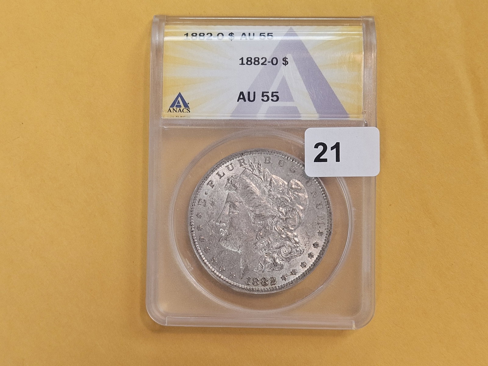 ANACS 1882-O Morgan Dollar in About Uncirculated - 55: Even wear