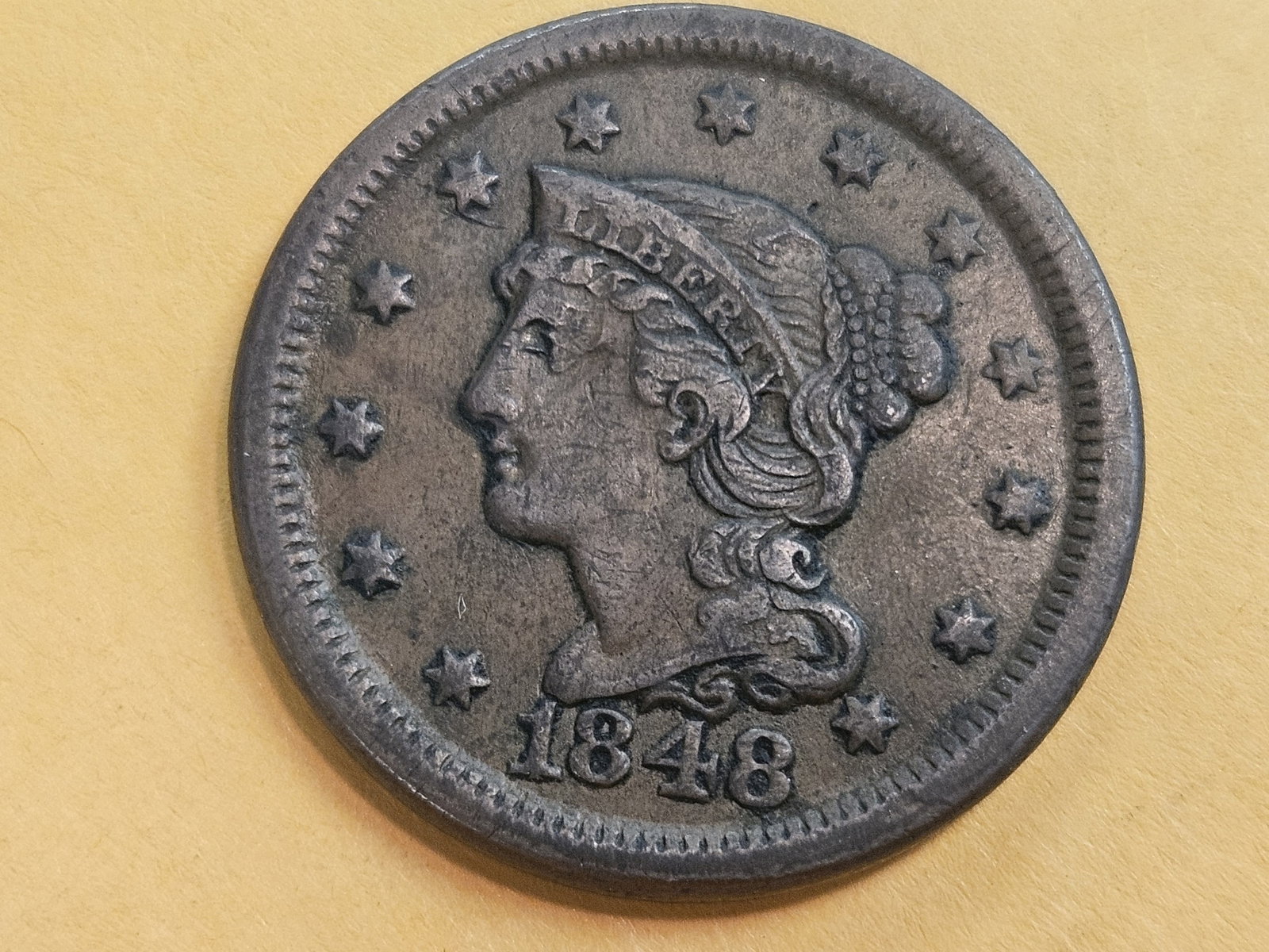 1848 Braided Hair large cent in Extra Fine: The 1 touches the bust