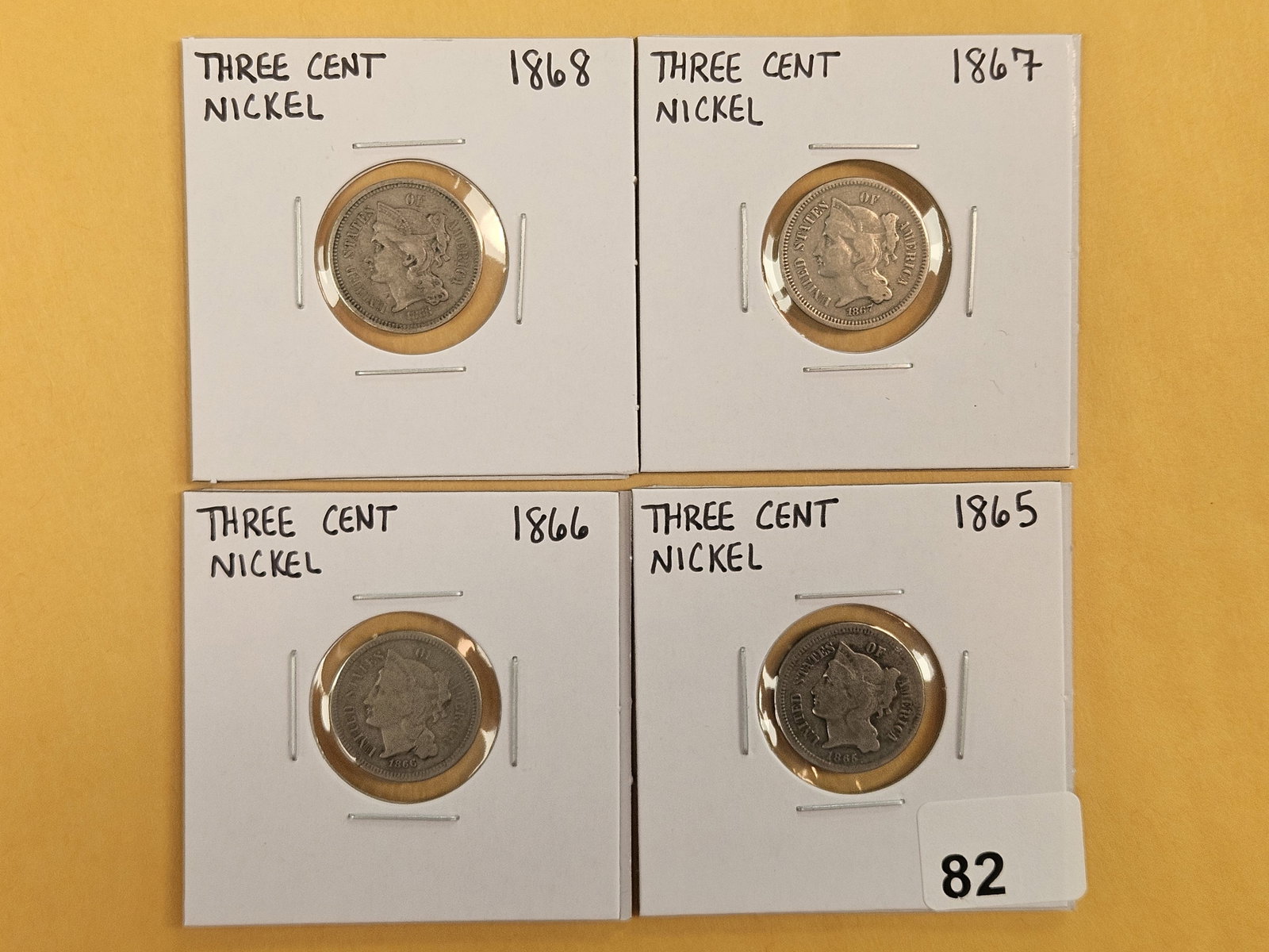 Four mixed 3-Cent Nickels: 1865, 66, 67, 68