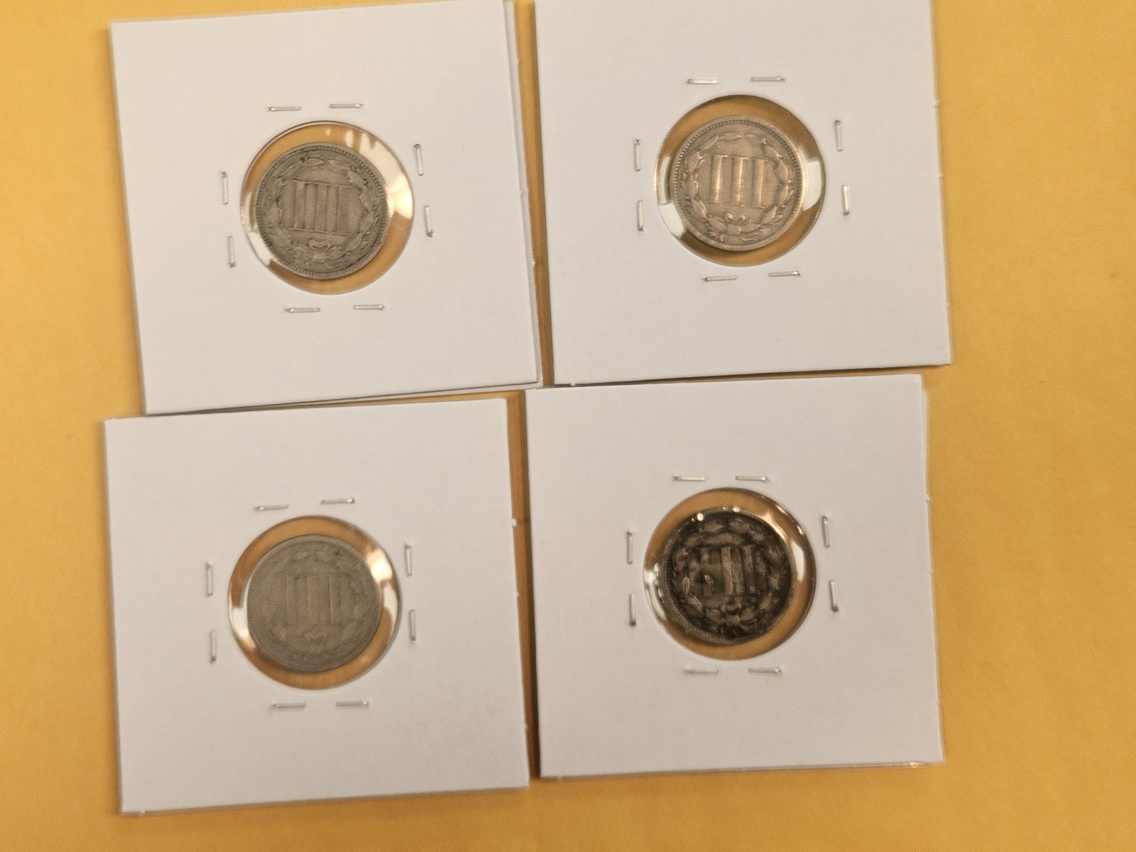 Four mixed 3-Cent Nickels - 3