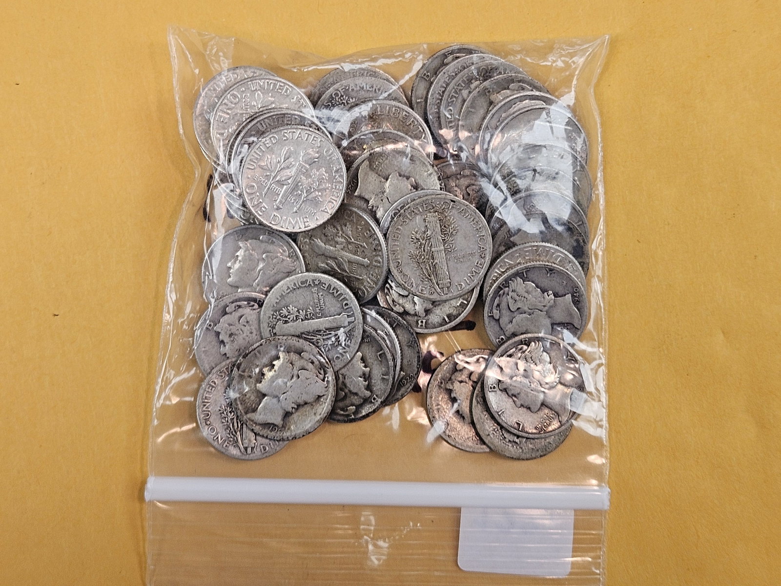 Fifty-three mixed silver Mercury and Roosevelt Dimes - 2