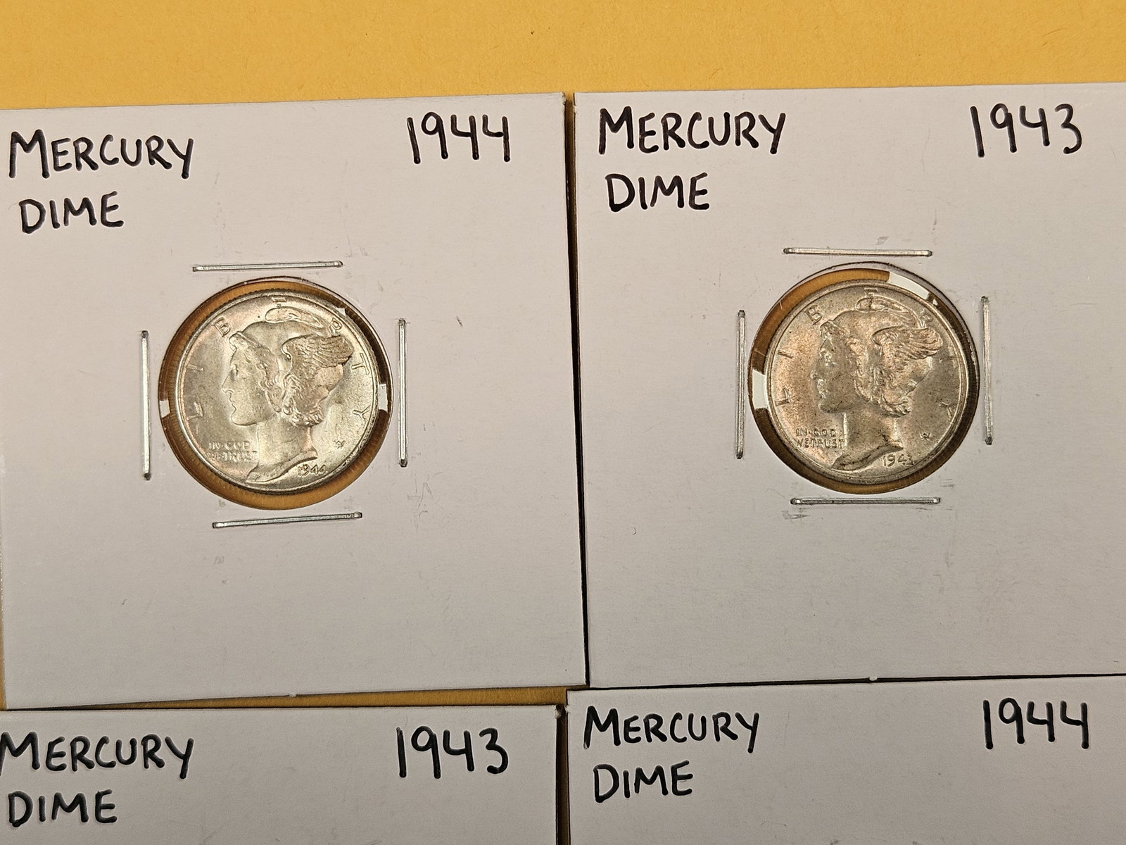 Five silver Mercury Dimes - 2