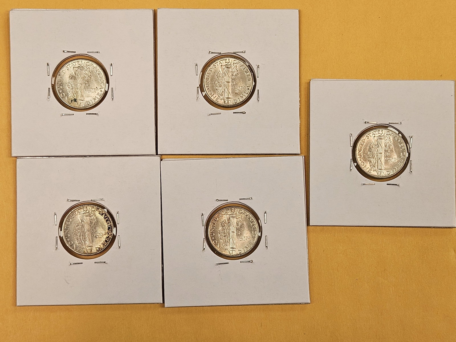 Five silver Mercury Dimes - 5
