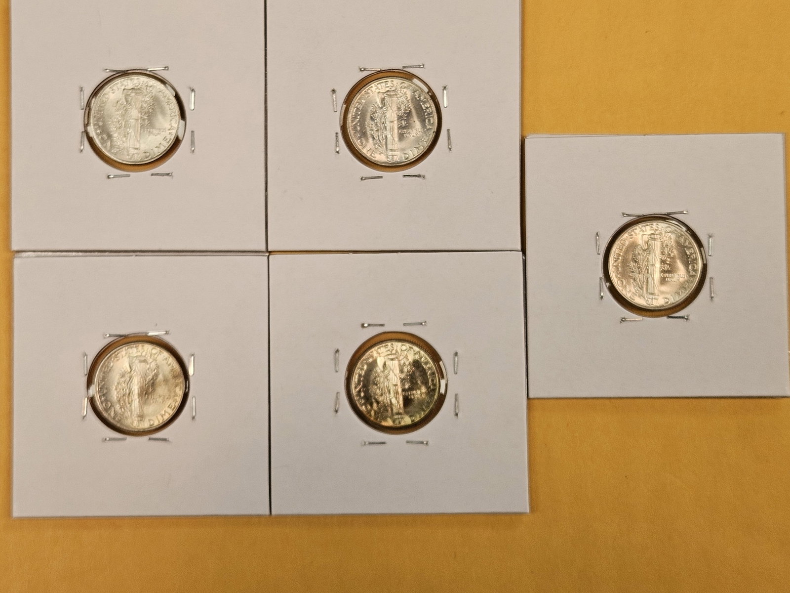Five silver Mercury Dimes - 5