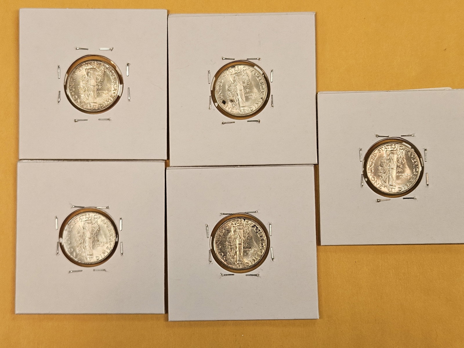 Five silver Mercury Dimes - 5
