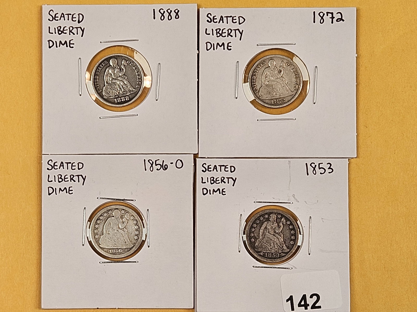 Four Seated Liberty silver dimes in Fine to Very Fine: 1888, 1872, 1856-O and 1853
