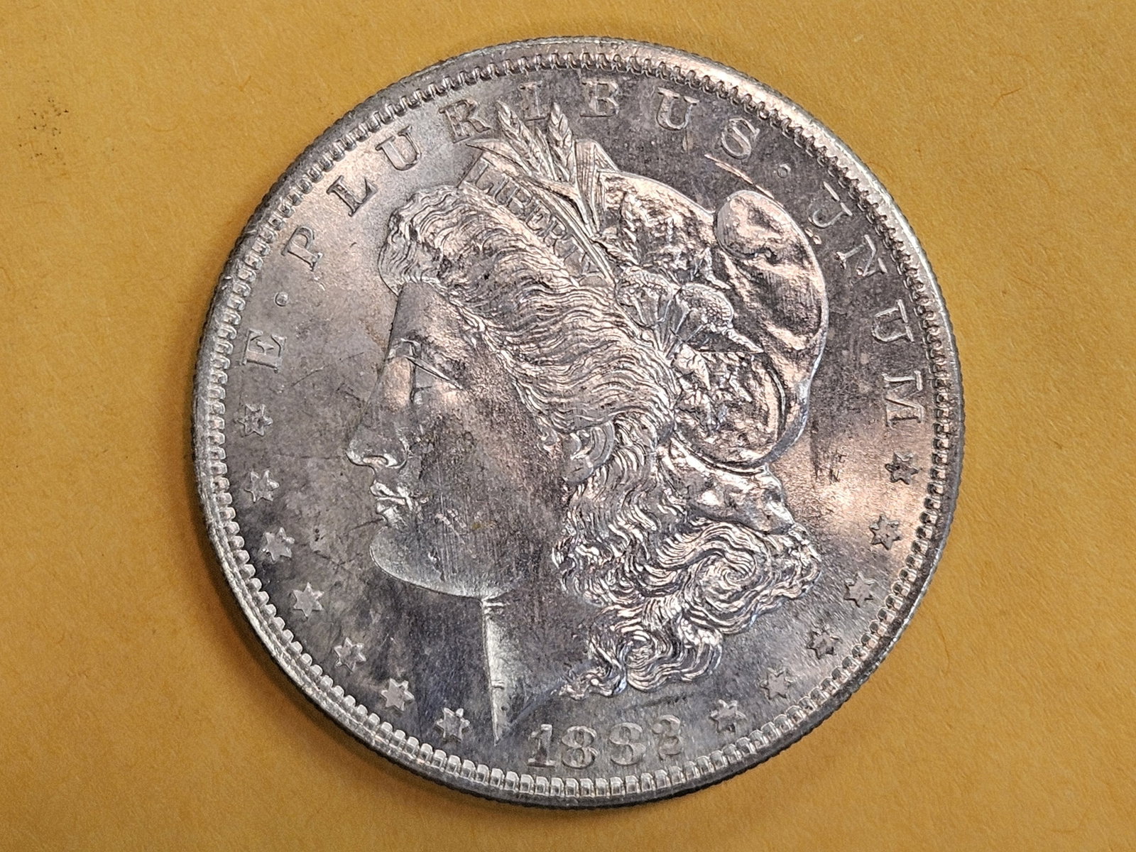 Choice Brilliant Uncirculated plus 1882-S Morgan Silver Dollar: near-prooflike