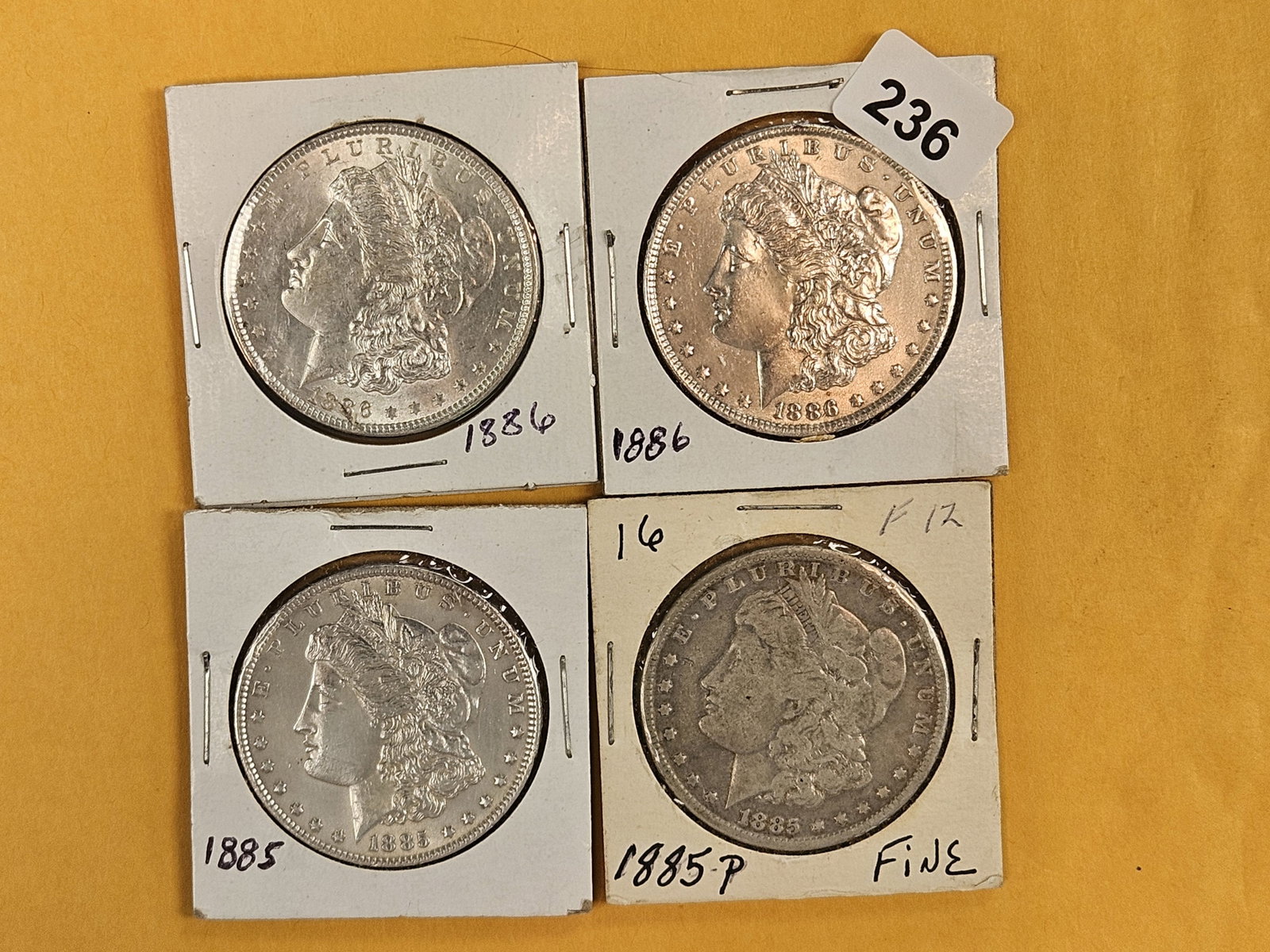 Four Morgan Silver Dollars: Mixed
