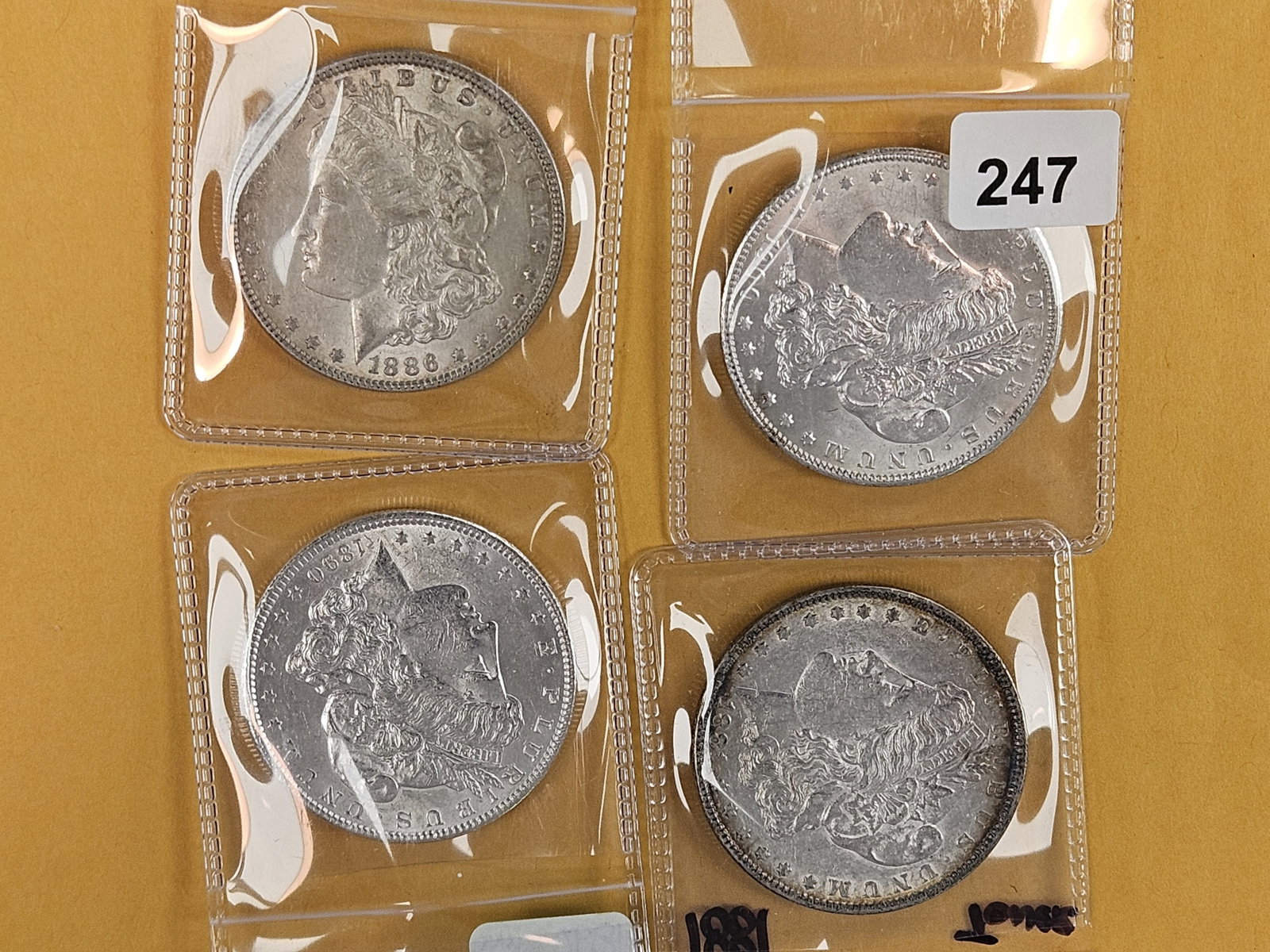 Four Brilliant AU-BU Morgan Silver Dollars: Mixed