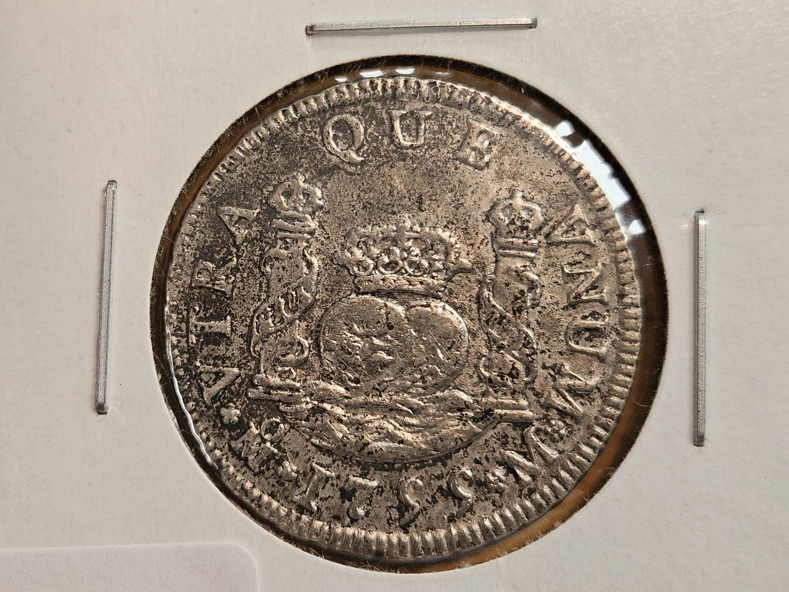 * 1755 Mexico silver 2 reals: Looks XF-AU. Seawater effect