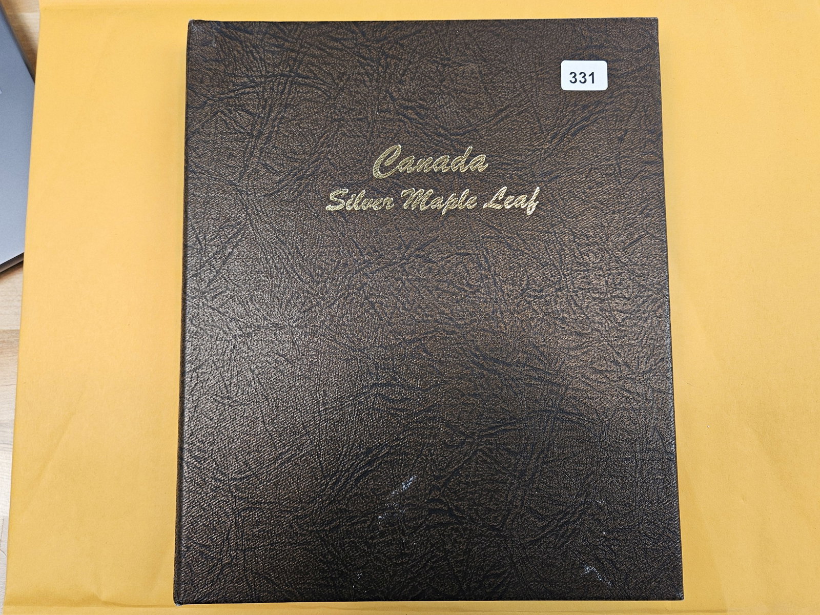 NICE! Partially Complete Canada SILVER Maple Leaf Collection: There are 18 (eighteen) SILVER One troy ounce Canadian Maple Leafs in here. Nice Dansco Album