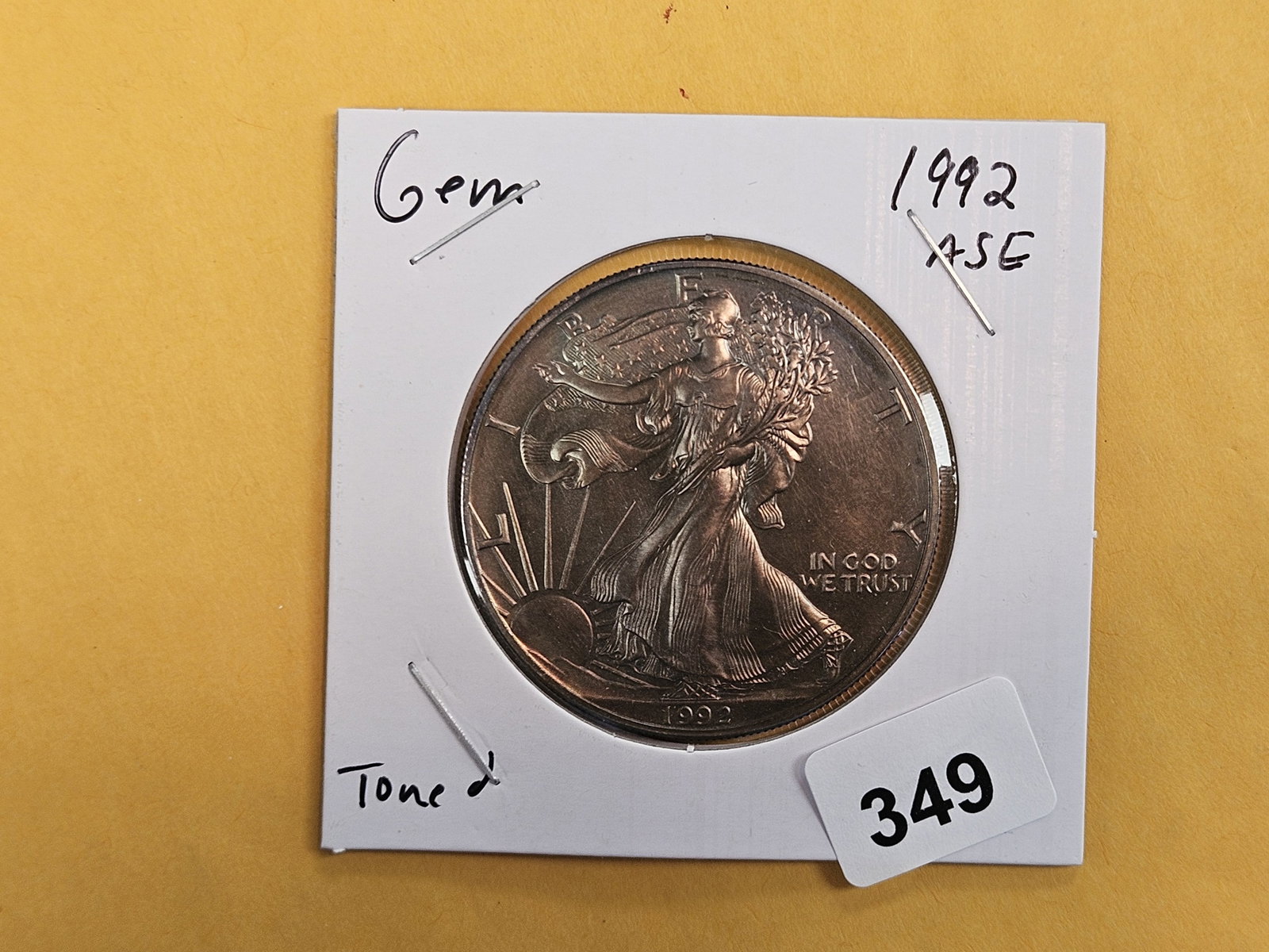 And last, but not least, a GEM BU 1992 ASE Toned: Thanks all for another great auction! Have a lovely night, wonderful week and we'll see ya'll again next time.