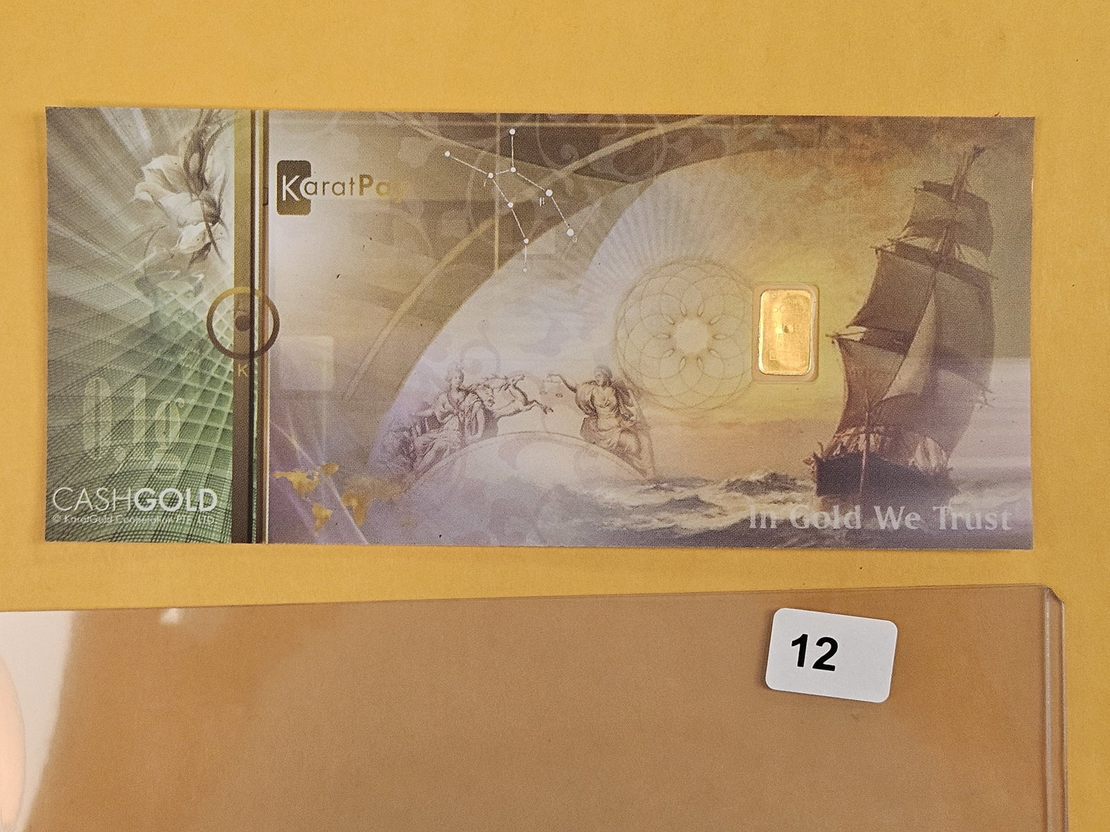 GOLD! KARATBARS CashGold .9999 fine Gold bar: In a polymer note. Weighs .1 grams